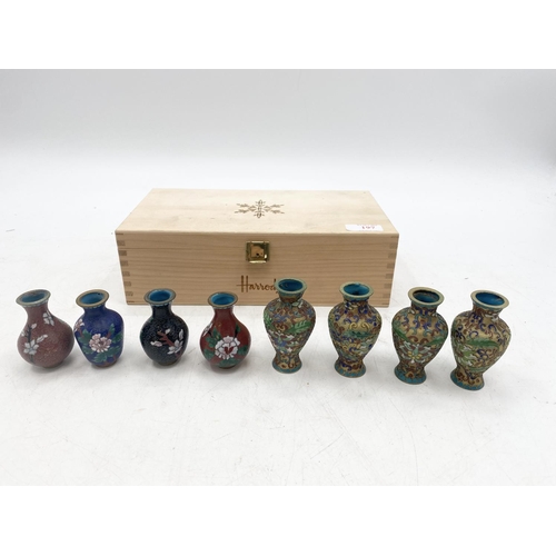 197 - A set of eight miniature cloisonne bottles, in presentation box