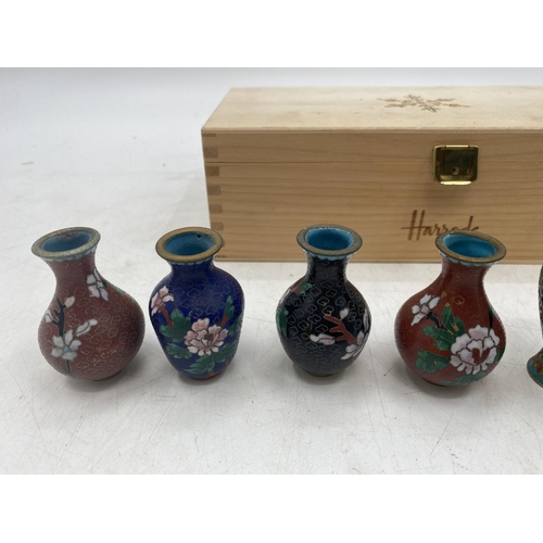 197 - A set of eight miniature cloisonne bottles, in presentation box