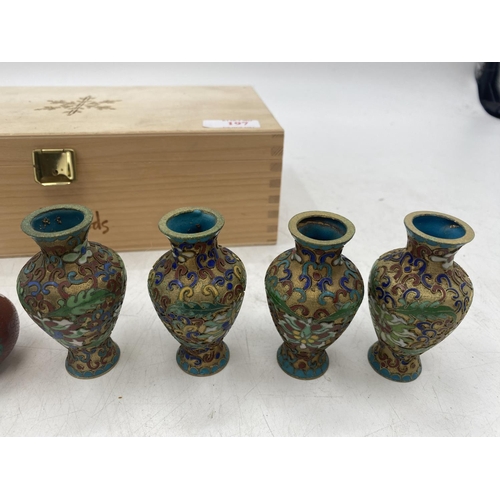 197 - A set of eight miniature cloisonne bottles, in presentation box