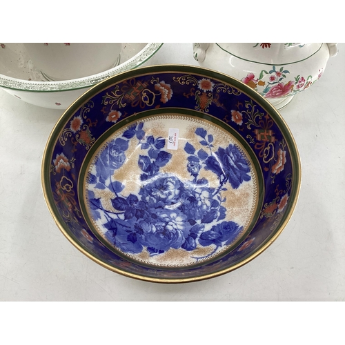 203 - A large Royal Doulton footed presentation bowl in blue floral and gilt pattern, 31cmDiam, a large wa... 