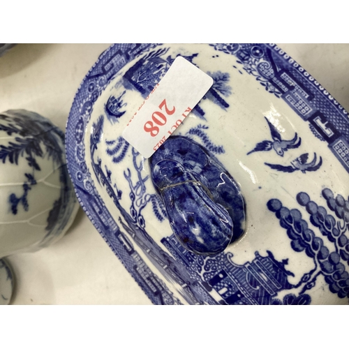 208 - A quantity of blue and white decorative china, some with cracks, to include Wedgwood, Willow Pattern... 