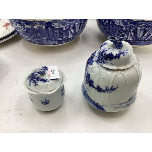 208 - A quantity of blue and white decorative china, some with cracks, to include Wedgwood, Willow Pattern... 