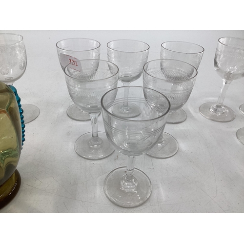 232 - A mixed collection of glassware to include Venetian glass vase, Edwardian etched glasses, and Swarov... 