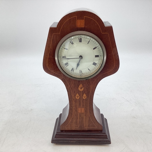 257 - An early C20th mahogany inlaid mantel clock in the Art Nouveau style, 31cmH