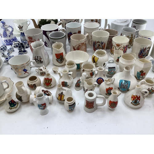 326 - Quantity of Goss crested China ware, and Commemorative memorabilia mugs, and a Copeland Spode Victor... 