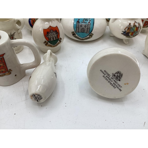 326 - Quantity of Goss crested China ware, and Commemorative memorabilia mugs, and a Copeland Spode Victor... 