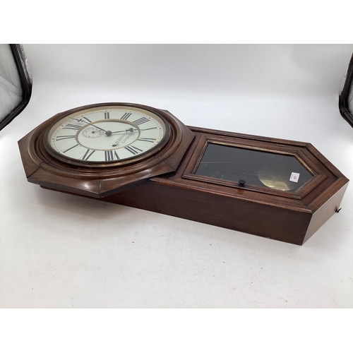 401 - A mahogany drop head wall clock, 8 day movement, dial signed H Renold London; and an oak framed Baro... 