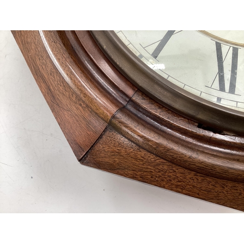 401 - A mahogany drop head wall clock, 8 day movement, dial signed H Renold London; and an oak framed Baro... 