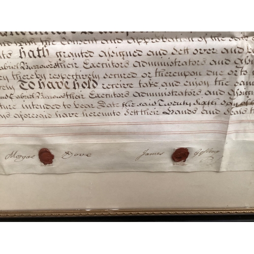 522 - Two framed and glazed C18th  Indentures