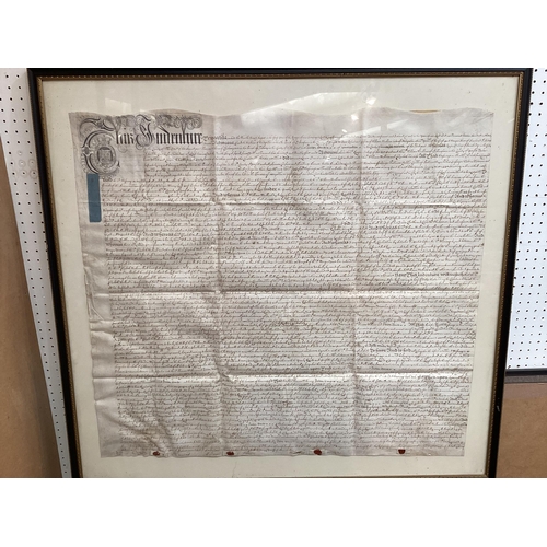 522 - Two framed and glazed C18th  Indentures