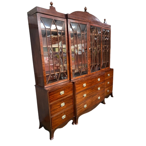 569 - A good Regency breakfront inlaid mahogany library bookcase, with glazed upper parts, 260cmH x 244cmW... 