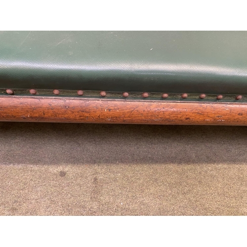 578 - Victorian oak framed studded green rexine seat, possibly ex railway waiting room 410 cm Long, in nee... 