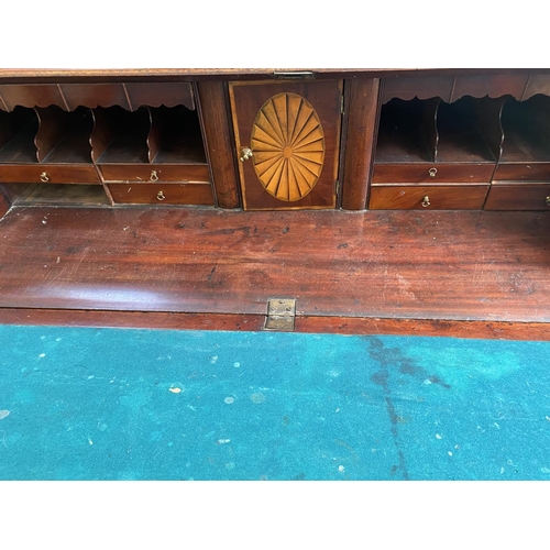 583 - A Mahogany bureau 117 cm W x 53 cm D x 106.5 cm H, some fading and wear