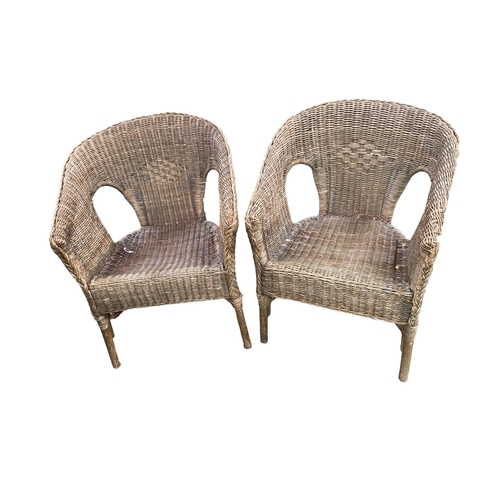 591 - Pair of garden/conservatory wicker style arm chairs, some wear to wicker