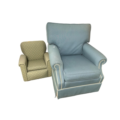 615 - A Peter Guild blue Upholstered arm chair with cream piping, small areas of wear to arms, some wear t... 