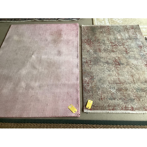 678 - Two modern rugs, pink by Laura Ashley (some wear), 140 x 200cm; and cream ground rug labelled Gooch ... 