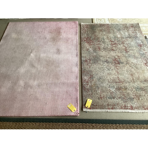 678 - Two modern rugs, pink by Laura Ashley (some wear), 140 x 200cm; and cream ground rug labelled Gooch ... 