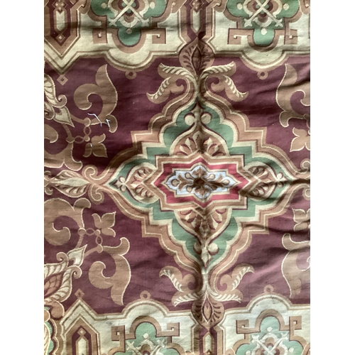 683 - Needlepoint throw, with a maroon central coloured ground, and with brown fabric backing, 145 x 180cm