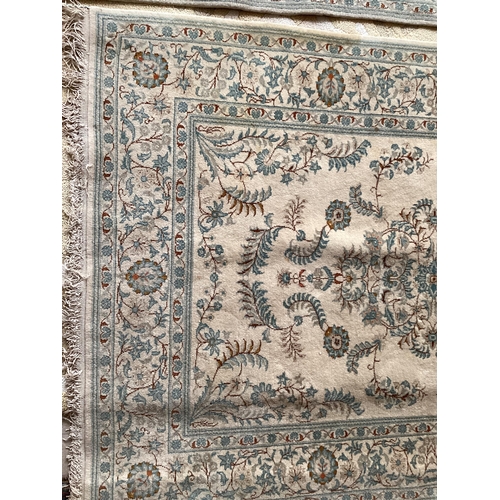 688 - An excellent quality  near pair of rugs, Persian, silk and wool, with beige ground and blue floral d... 