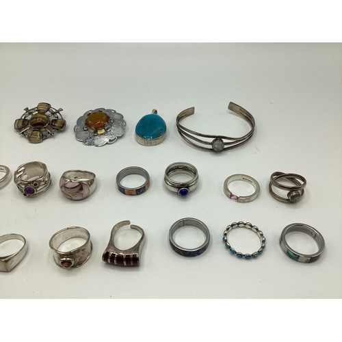 16 - A collection of sterling silver and white metal jewellery to include gem set rings , Scottish hardst... 