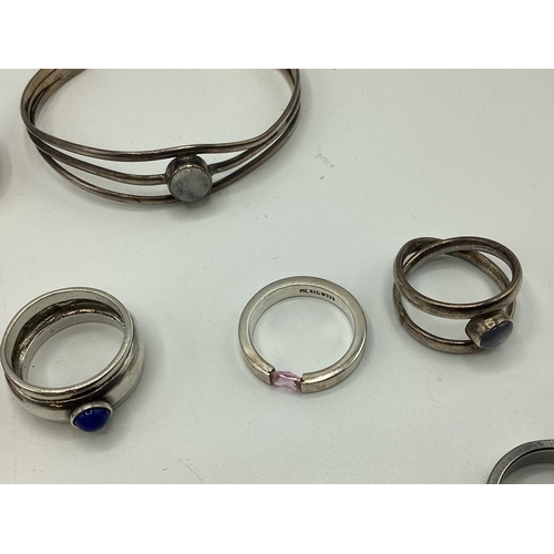 16 - A collection of sterling silver and white metal jewellery to include gem set rings , Scottish hardst... 