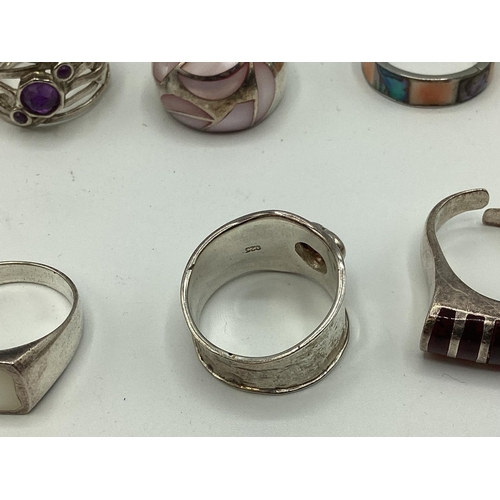 16 - A collection of sterling silver and white metal jewellery to include gem set rings , Scottish hardst... 