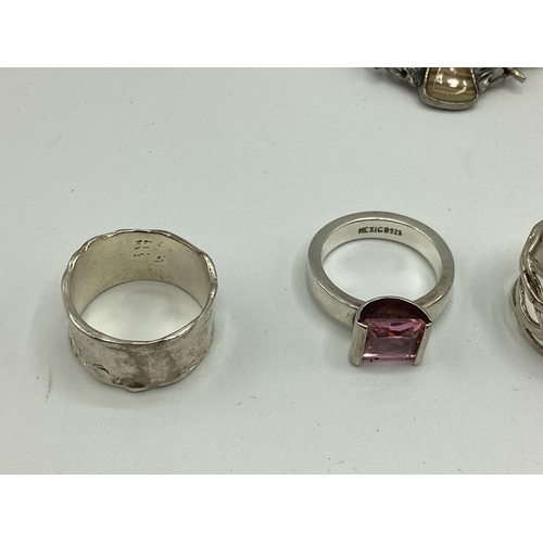 16 - A collection of sterling silver and white metal jewellery to include gem set rings , Scottish hardst... 