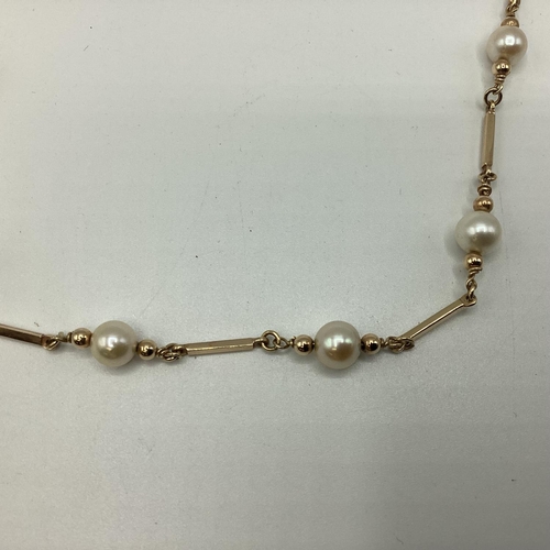 17 - A 9ct gold necklace and bracelet set with cultured pearls in fitted case. 19.62g. 44cm and 20cm.