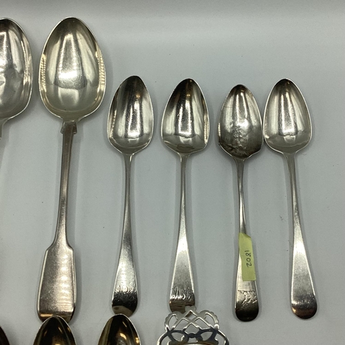 23 - A collection of sterling silver flatware together with a silver tea strainer. 363g.