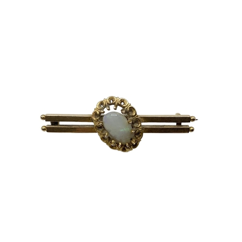 26 - A 15 ct gold double bar broach set with oval central opal together with 9ct gold ruby and pearly set... 