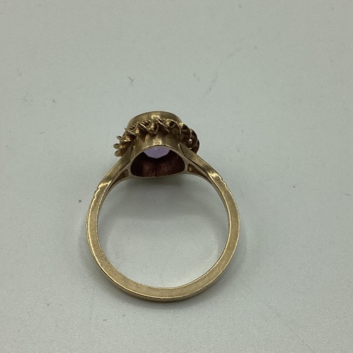 27 - A 9 ct gold amethyst set ring 2.4 g size K