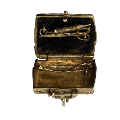 29 - 4 x 9ct gold charms to include Gladstone doctor's bag with separate tools and instruments, yellow me... 