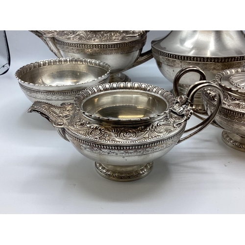 3 - A sterling silver five piece tea set of heavy gauge with cast acanthus leaf decoration by Amos Broth... 