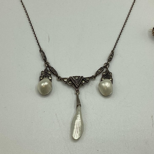 Three pieces of Marcasite set jewellery to include pearl and quartz set ...