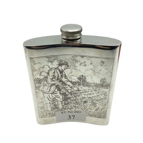 37 - A Sheffield Pewter hipflask with chased hunting scenes with certificate in presentation box