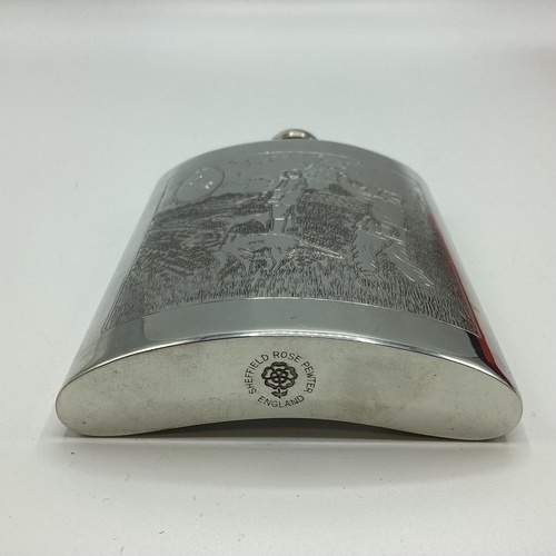 37 - A Sheffield Pewter hipflask with chased hunting scenes with certificate in presentation box