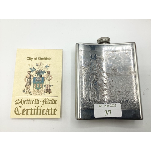 37 - A Sheffield Pewter hipflask with chased hunting scenes with certificate in presentation box