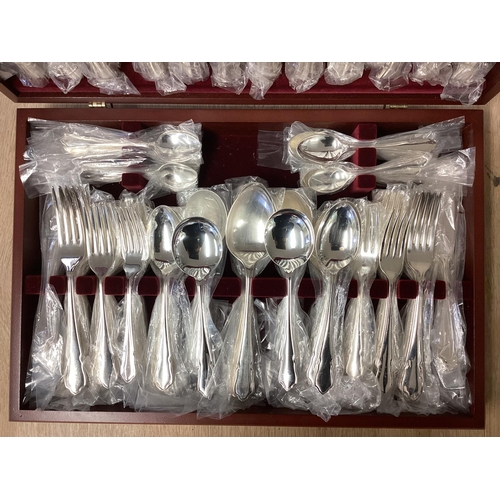 42 - A boxed canteen of Sheffield plated flatware, 12 person setting in original packaging, by John Steph... 