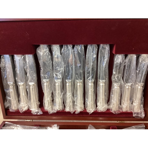 42 - A boxed canteen of Sheffield plated flatware, 12 person setting in original packaging, by John Steph... 