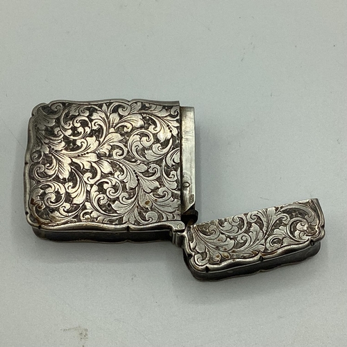 43 - A sterling silver pocket Vesta with chased acanthus leaf decoration by Nathan and Hayes Chester 1895... 