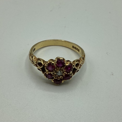 46 - Two 18 ct gold ruby and diamond set rings, first set with central brilliant cut diamond and surround... 