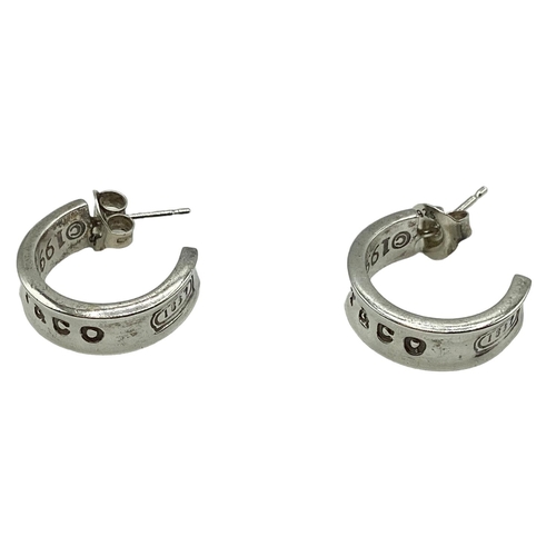 48 - A pair of sterling silver half hoop Tiffany earrings, both marked Tiffany 5.47 g