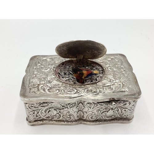 5 - A continental silver automaton singing bird music box. Scrolling leaf decoration. Marked ES 925 ster... 