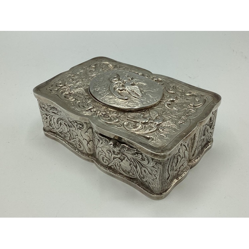 5 - A continental silver automaton singing bird music box. Scrolling leaf decoration. Marked ES 925 ster... 