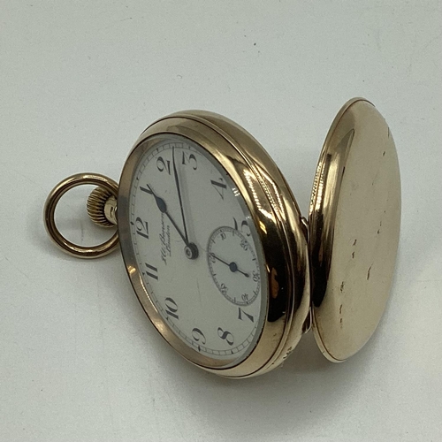 52 - A 9 ct gold open faced pocket watch face marked JW Benson London, 32 mm face with Arabic markers and... 