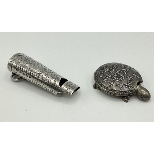 54 - Two novelty white metal items.  Sterling silver whistle vesta by Steinhart and CO Birmingham 1905 to... 