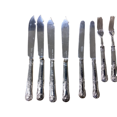 57 - A collection of sterling silver flatware and cutlery. Mainly in the Kings Pattern. Approx 107ozt. KN... 