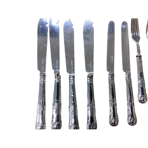 57 - A collection of sterling silver flatware and cutlery. Mainly in the Kings Pattern. Approx 107ozt. KN... 