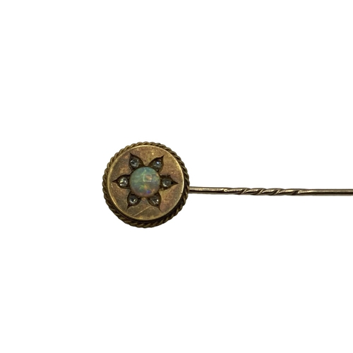 84 - A 15ct gold opal and rose cut diamond tie pin, 3grams