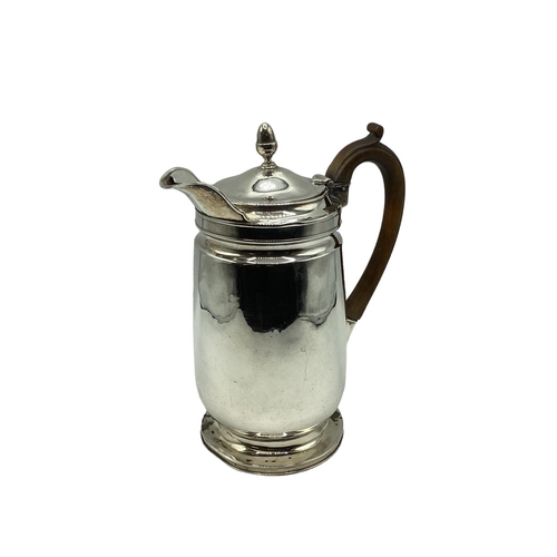 86 - A Sterling silver hot water jug, by JOHN EMES, London, 1804
20 OZT